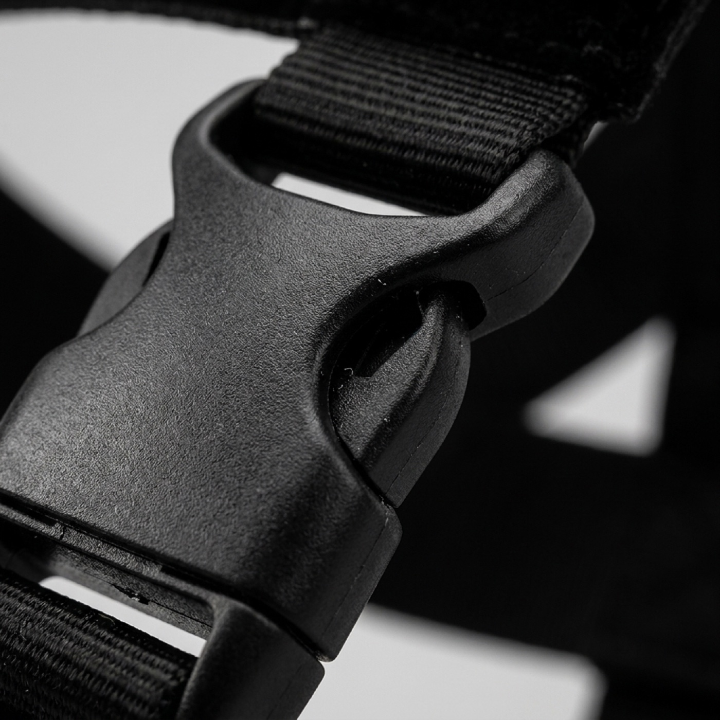 Close-up of the reinforced quick-release buckle that stays shut